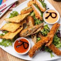 Appetizer Sampler · All of our most famous opening acts on one plate! Crispy wontons, jalapeno poppers, eggroll ...