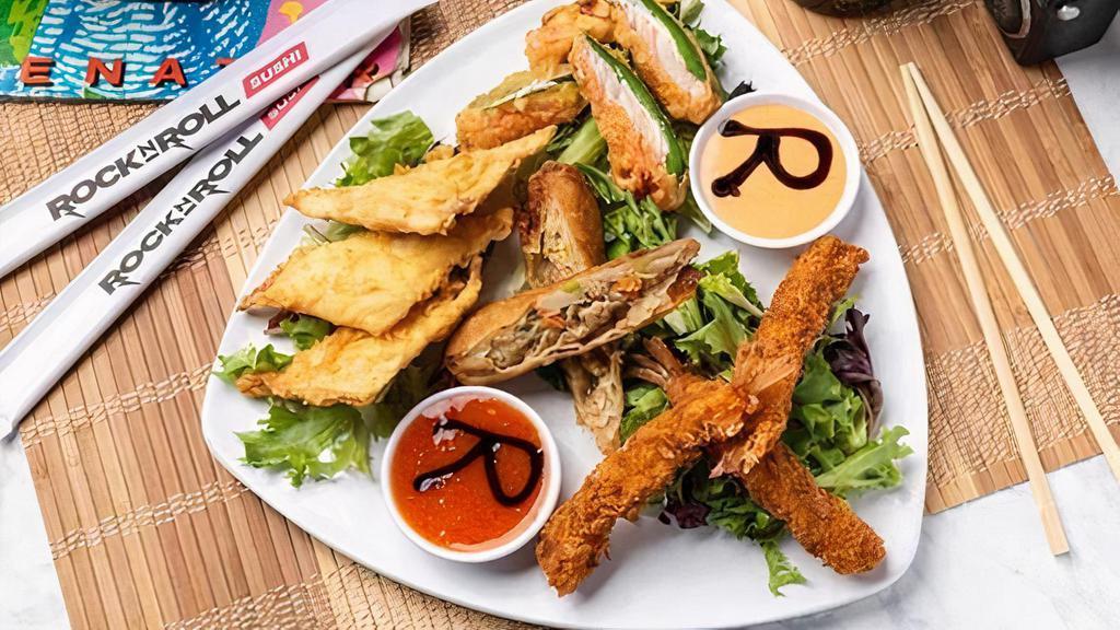 Appetizer Sampler · All of our most famous opening acts on one plate! Crispy wontons, jalapeno poppers, eggroll and TNT shrimp served with headbanger and sweet chili dip, both swirled with eel sauce.