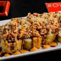 Thriller Roll · (FRIED) Scary good. Shrimp tempura and cream cheese inside, fully fried, then topped with ba...