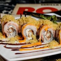 Metalhead · Enter delicious. Shrimp tempura and cream cheese inside, crab stick outside, topped with spi...