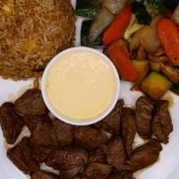 Filet Mignon Solo · Served with soup or salad, side of fried rice, vegetables and yum-yum sauce
