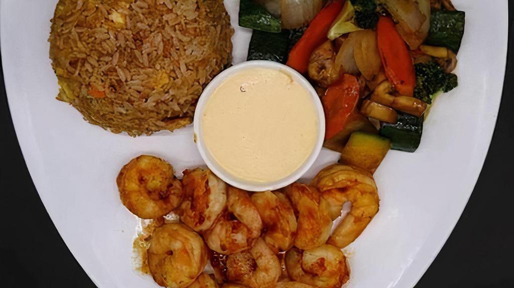 Shrimp Solo · Served with soup or salad, side of fried rice, vegetables and yum-yum sauce