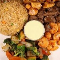 Filet, Shrimp, Chicken Trio · Served with soup or salad, side of fried rice, vegetables and yum-yum sauce