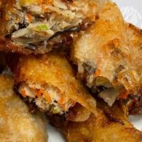 Thai Egg Roll · Deep fried handmade chicken and vegetable egg roll served with Thai sweet & sour sauce