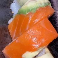 Rainbow Roll · California roll topped with tuna, white fish and avocado. Raw/undercooked.