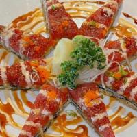 Spicy Tuna Sushi Pizza · Fried sushi pizza and topped with spicy tuna and baked