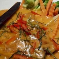 Chu Chee Salmon · Grilled salmon fillet with special curry sauce.