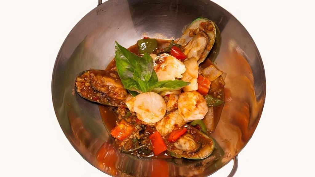 Basil Seafood · Mussel, scallop, squid, shrimp, onion, basil and bell pepper sauteed in spicy basil sauce.