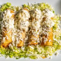 Flautas · Order of four: choice of chicken flautas, lettuce, topped with sour cream and cheese. Includ...