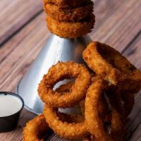 Giant Funnel Tower Of Jumbo Piston Onion Rings · Delicious golden brown breading, served with homemade chipotle ketchup and ranch.