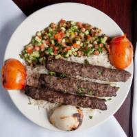 Kofta Kabab Plate · Ground lamb and beef spiced and broiled served with rice and salad.