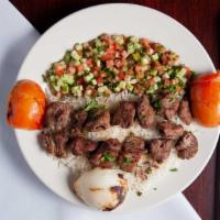 Beef Shawarma Plate · Beef shawarma meat served with rice and salad.