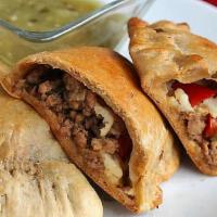 Beef Empanadas · Beef, sweet plantains, onions, tomato sauce, green and red peppers.