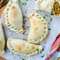 Veggies Empanadas · Onions, tomatoes, green peppers, red peppers, zucchini, eggplant, and Italian seasoning. Veg...