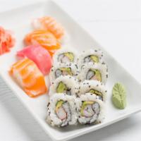 Sushi Deluxe · Assorted salmon, tuna, eight pieces shrimp.