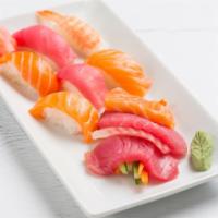 Sushi Or Sashimi Combo · Assorted salmon, tuna, shrimp eight pieces seaweed salad.