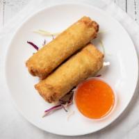 Spring Roll (2) · Veggies (shredded cabbage, carrots, and celery) rolled In a crispy egg roll wrapper.