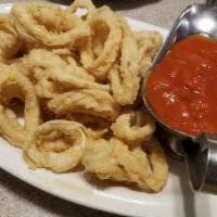 Calamari With Marinara · Includes garlic knots, pasta, soup or salad.