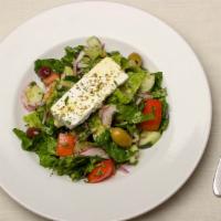 Mediterranean Salad · Lettuce, cucumber, tomatoes, kalamata olives, feta cheese, parsley, and red onion.