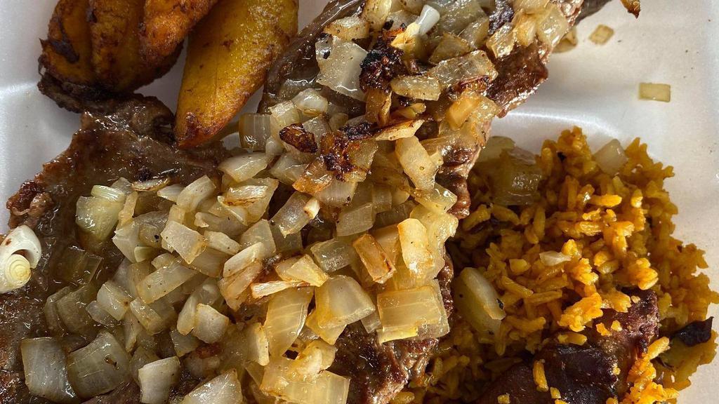 Arkie'S Plate-Churrasco/ Skirt Steak · Con Arroz Blanco, Habichuelas y Maduros O Arroz con Gandules y Maduros/ White rice, beans and sweet plantains OR Yellow rice with pigeon peas and sweet plantains