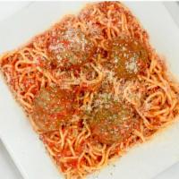 Spaghetti With Meatballs · Spaghetti in homemade Marinara sauce with meatballs. Served with Garlic Rolls.