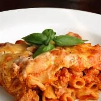 Baked Ziti · Ziti noodles in marinara ricotta sauce baked in the oven with melted mozzerella cheese. Serv...