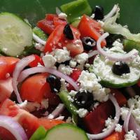 Greek Salad · Iceberg and romaine lettuce, carrots, red cabbage, tomatoes, onion, green and black olives, ...
