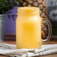 Mango Madness · mango, orange, pineapple, banana, agave; topped with bee pollen.