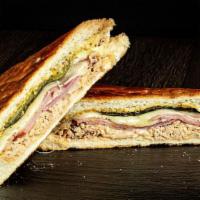 Turkey Cuban · House-roasted turkey, smoked turkey ham, melted Swiss cheese,  pickle and mustard. Pressed a...