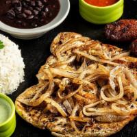 Palomilla Chicken Plate · Grilled chicken breast filet topped with sauteed onions and homemade mojo. Served with white...