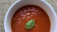 Tomato Soup · Creamy blend of tomatoes flavoured with garlic and herbs.