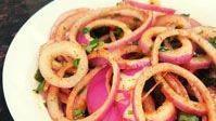 Onion Salad · Served with onions, green chili and lemon.