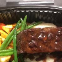 Impossible Vegan Roast · Impossible Meatless Roast with Red Wine Sauce. Served over Vegan Mashed Potatoes, and Steame...