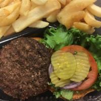 Grilled ½ Pound Hamburger · All served with House Special Seasoned Steak Fries, Lettuce, Tomato, Onion, Pickles and a Dr...
