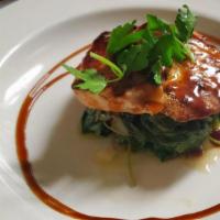 Salmon · Grilled Atlantic salmon with. a bourbon glaze served on a. bed of spinach with choice of. si...