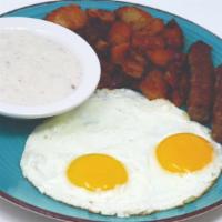 Chuck Wagon Grand Slam · Two large eggs, bacon or sausage, home fries or grits, country style sausage gravy and toast...