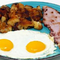 2 Eggs & Ham Steak · Ham Steak & 2 Fresh Eggs cooked your way, served with a side of Toast or Biscuits and Home F...