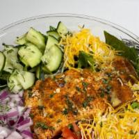 Seafood Salad  · Choice of Salmon or Shrimp, Romaine, Tomatoes, Cucumbers, Red Onions, Four Blend Cheese and ...