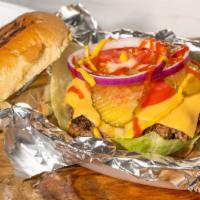 Big Boy Burger · Classic 1/3 lb burger topped with American cheese, lettuce, tomato, onion, pickles, ketchup,...
