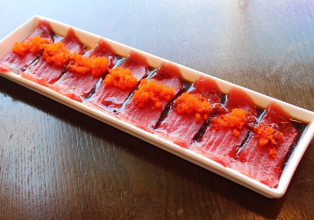 Tuna Carpaccio(8Pcs) · Eight slices of tuna or salmon served with carpaccio sauce.