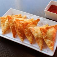 Krab Rangoon (6Pcs) · Krab meat and cream cheese rolled in wonton skin and deep fried served with sweet and sour s...