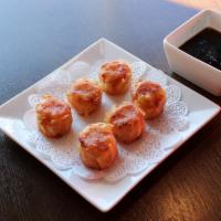 Shumai (6Pcs) · Pan fried or steamed, Japanese shrimp dumpling.