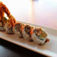 Spider Roll(6Pcs) · Soft shell crab, fish egg, cucumber, and avocado served with eel sauce.