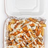 Buffalo Chicken Fries · Hot bed of fries, chicken tenders, buffalo sauce, secret sauce, ranch and pickles.