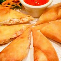 Crab Rangoon · Deep fried mixed crab meat and cream cheese wrapped in spring roll skin and served with Thai...