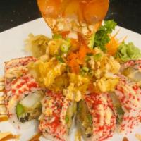 Lobster Roll · Lobster tempura, avocado, asparagus, masago and tempura flake topped with eel sauce.
