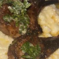 Lamb Chop & Grits · Lamb chops top with salsa Verde serve with creamy grits.