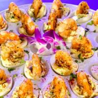 Creole Deviled Eggs (6) · Chef Special creole deviled eggs topped with shrimp.