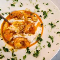 Shrimp & Grits · Creamy buttery grits paired with shrimp.