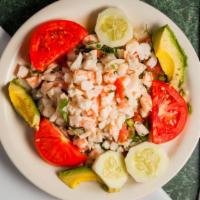 Ceviche Fish And Shrimp · Fresh fish with shrimp marinated and cooked in lime juice with chopped onions, tomatoes, cil...